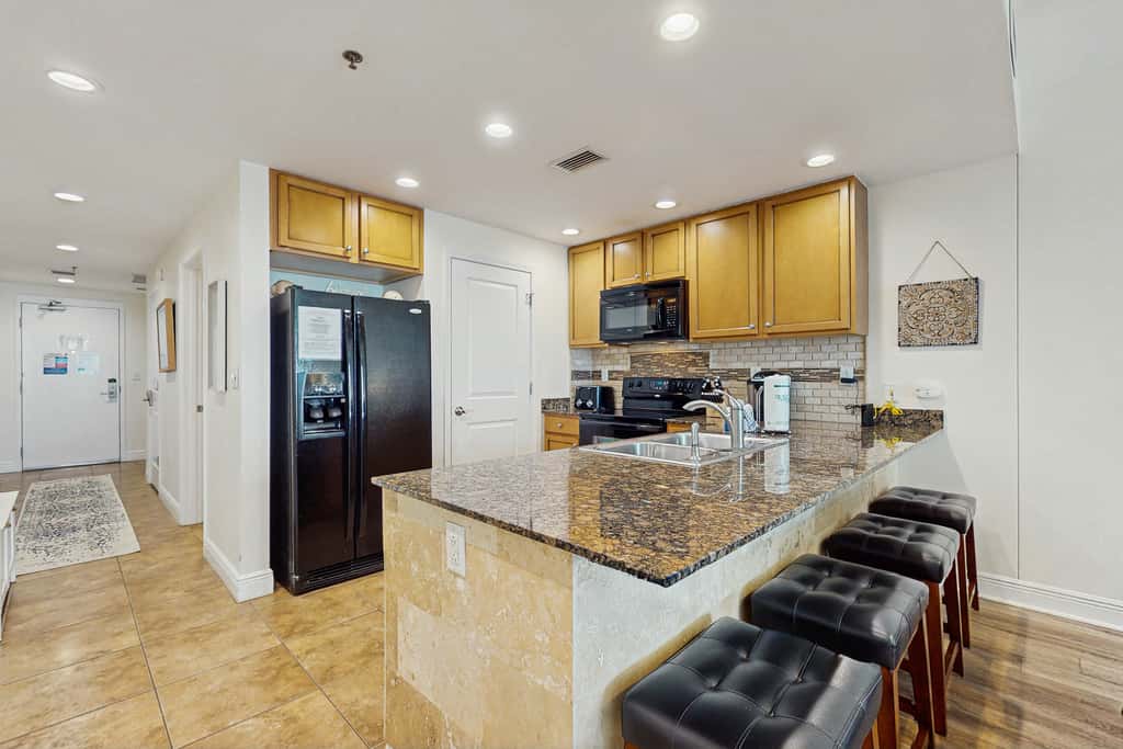 Updated beachfront retreat with hot tub, outdoor pool & balcony