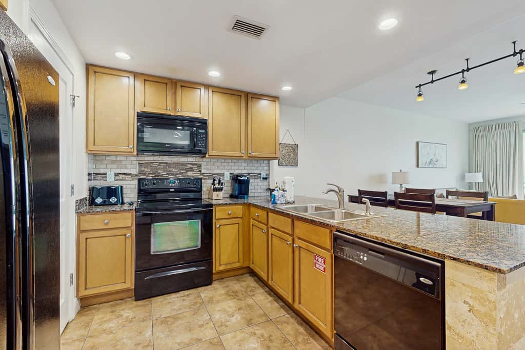 Updated beachfront retreat with hot tub, outdoor pool & balcony