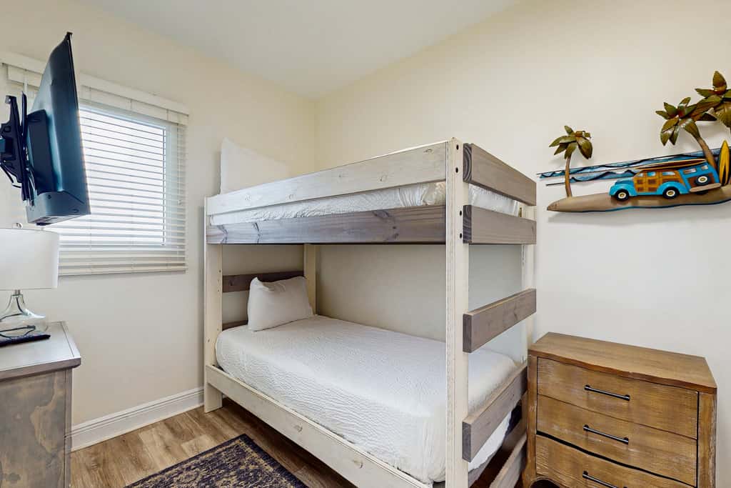 Updated beachfront retreat with hot tub, outdoor pool & balcony