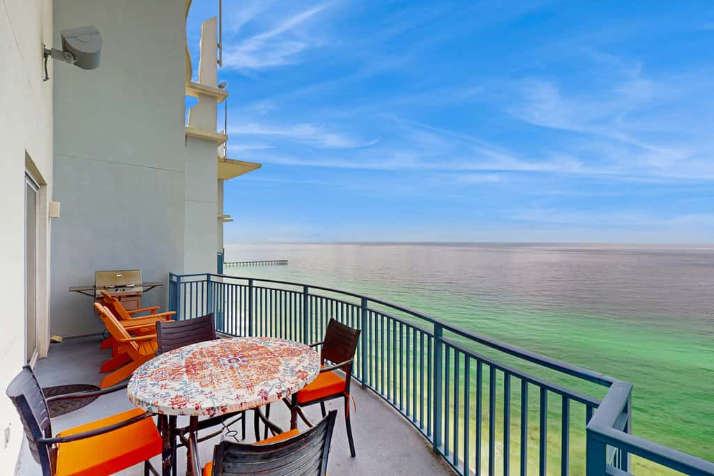 Updated beachfront retreat with hot tub, outdoor pool & balcony