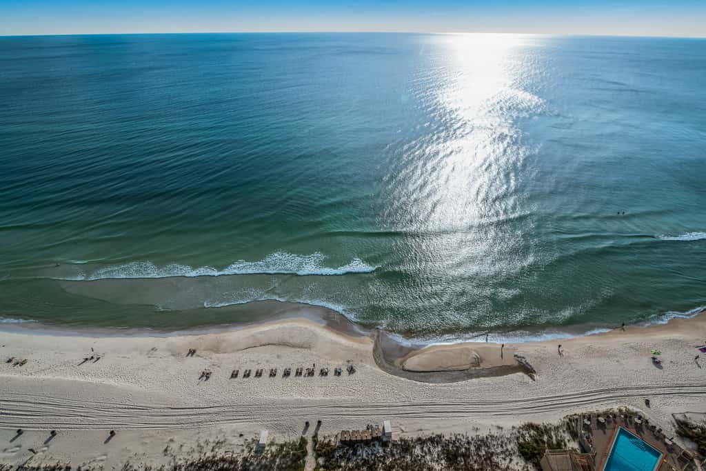 Updated beachfront retreat with hot tub, outdoor pool & balcony