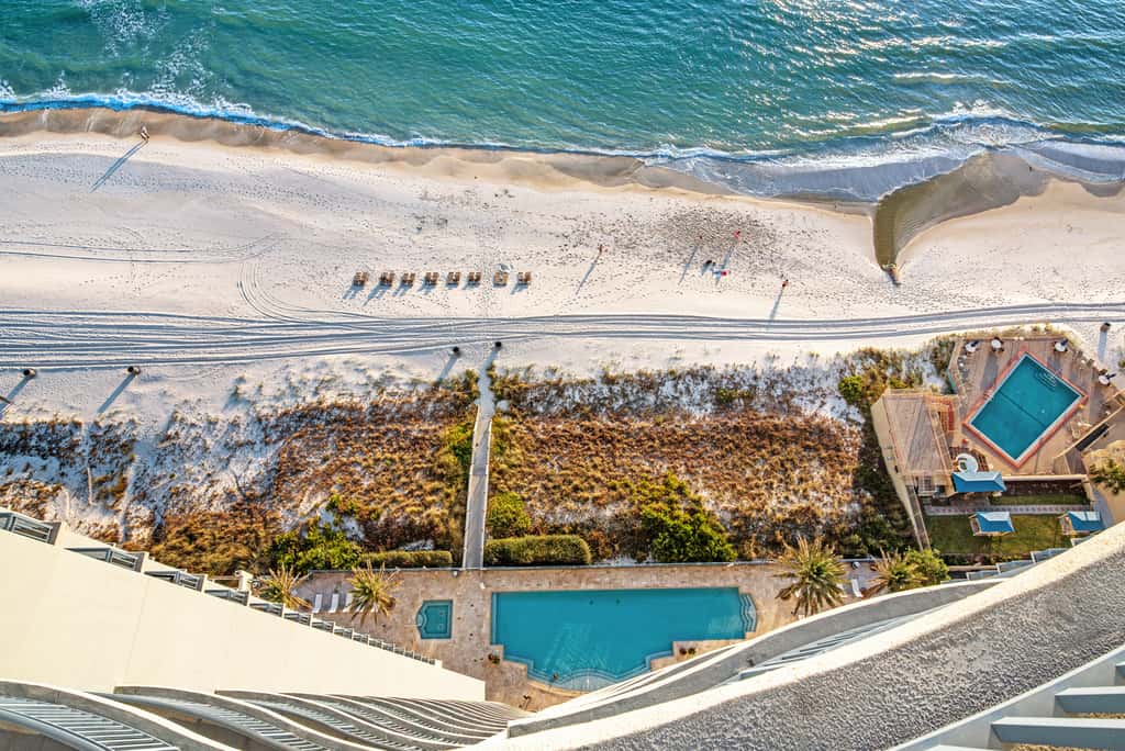 Updated beachfront retreat with hot tub, outdoor pool & balcony