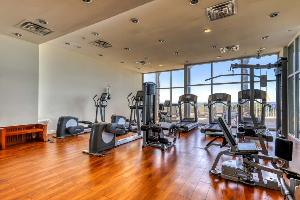 Updated beachfront retreat with hot tub, outdoor pool & balcony