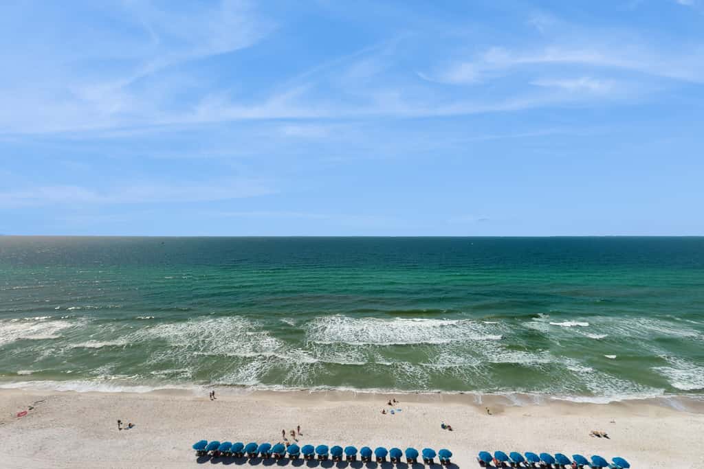 Gorgeous condo with private balcony, shared pool & beach access