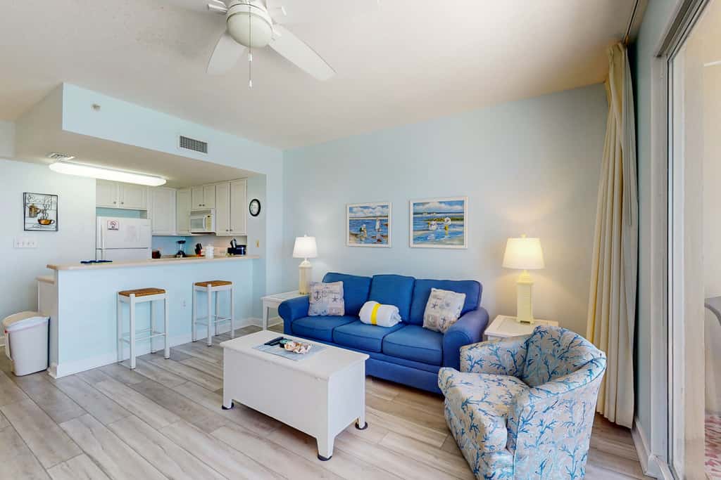 Gorgeous condo with private balcony, shared pool & beach access