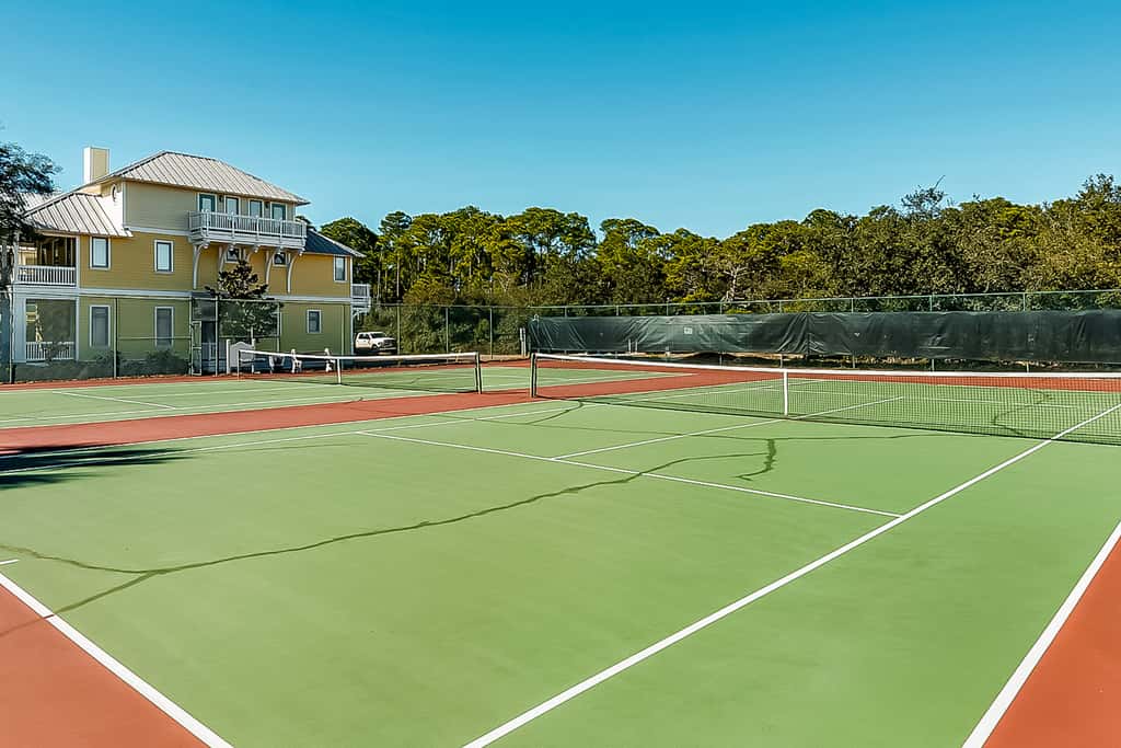 Spotless beachfront dream with views, a shared pool, & sports courts
