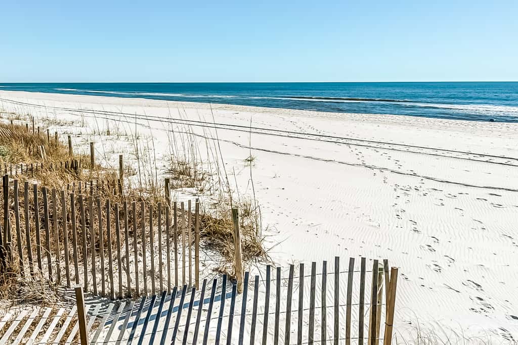 Spotless beachfront dream with views, a shared pool, & sports courts