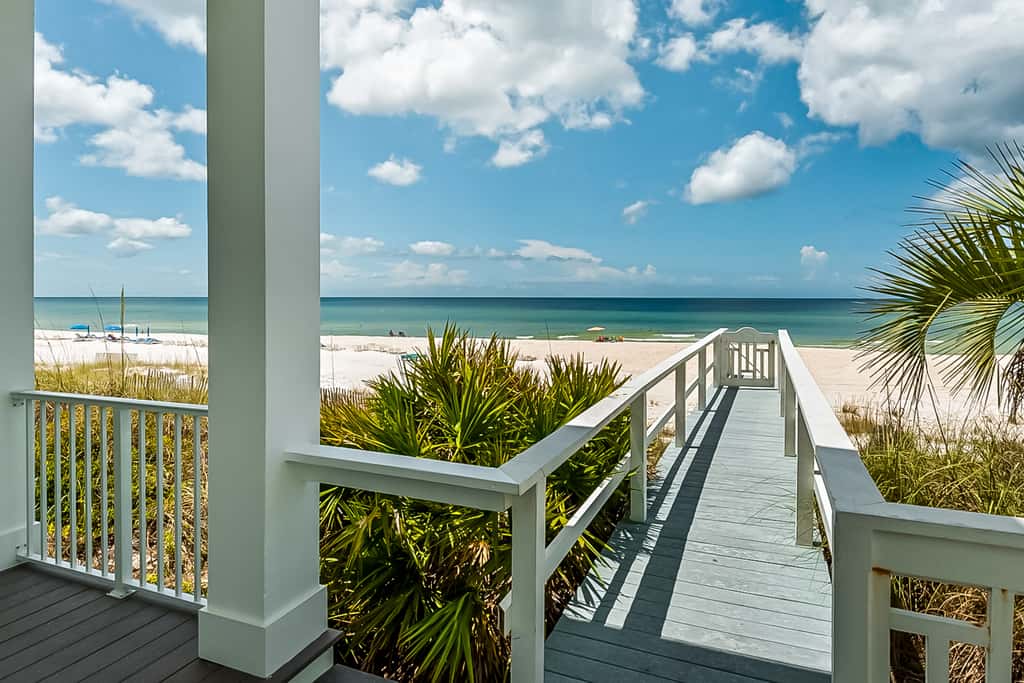 Spotless beachfront dream with views, a shared pool, & sports courts