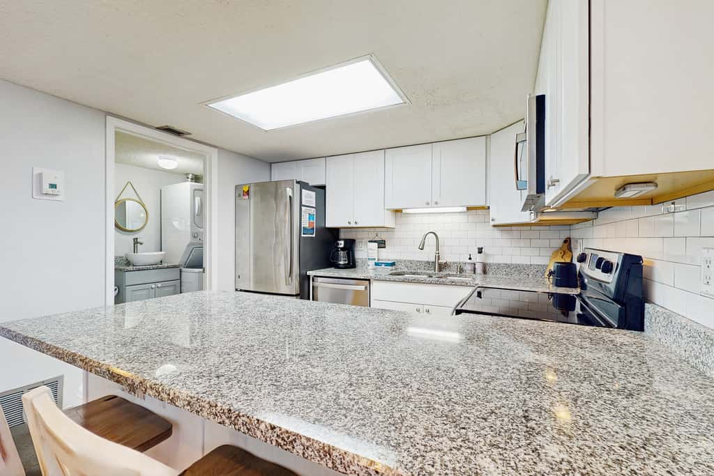Spectacular beachfront condo with great amenities, shared pool & beach access