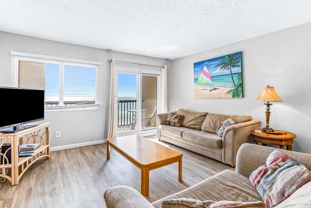 Beautiful Pinnacle Port condo with pools & basketball court right next to beach