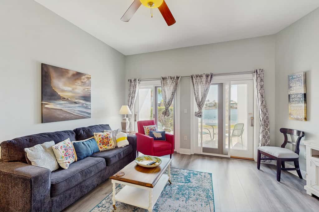 Lakefront dog-friendly condo with water views, pool, hot tub & beach access