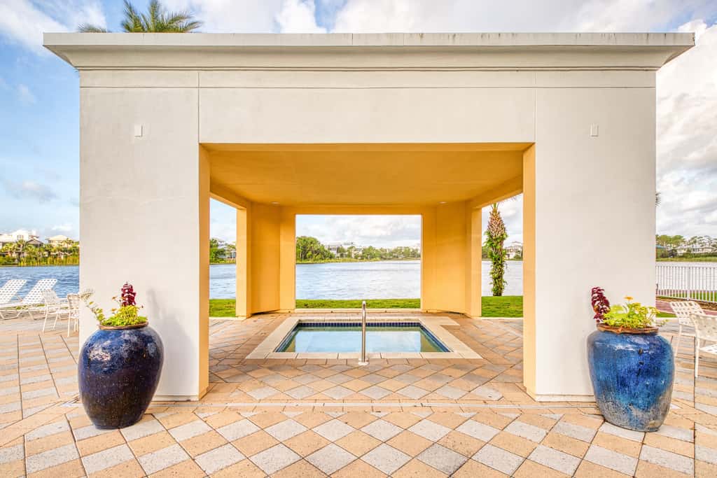 Lakefront dog-friendly condo with water views, pool, hot tub & beach access