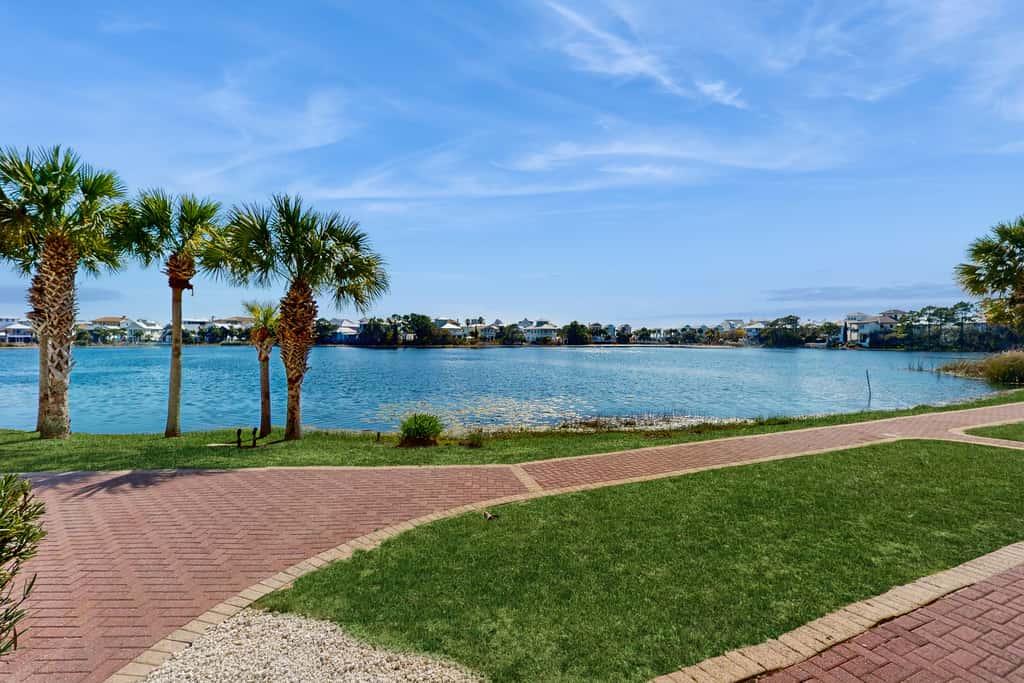 Lakefront dog-friendly condo with water views, pool, hot tub & beach access