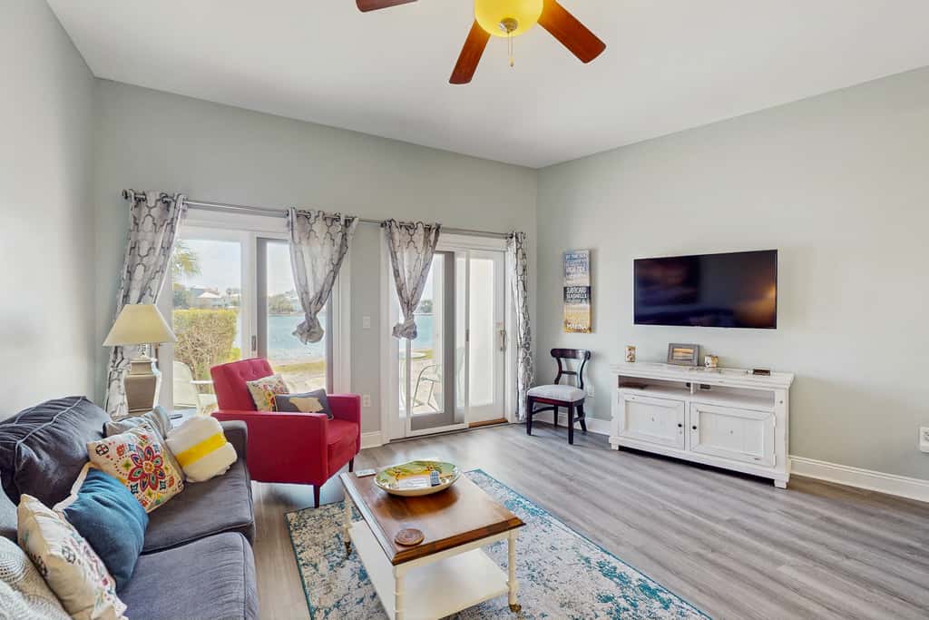 Lakefront dog-friendly condo with water views, pool, hot tub & beach access