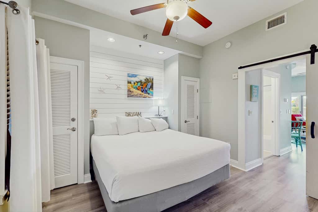 Lakefront dog-friendly condo with water views, pool, hot tub & beach access