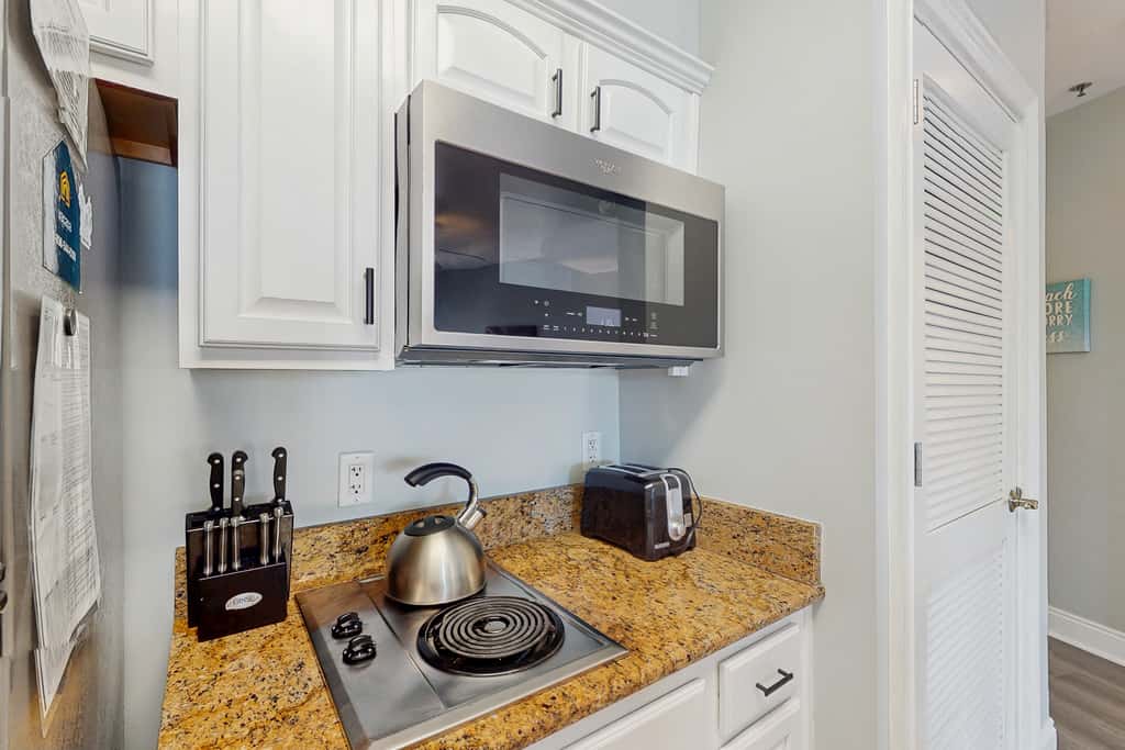 Lakefront dog-friendly condo with water views, pool, hot tub & beach access