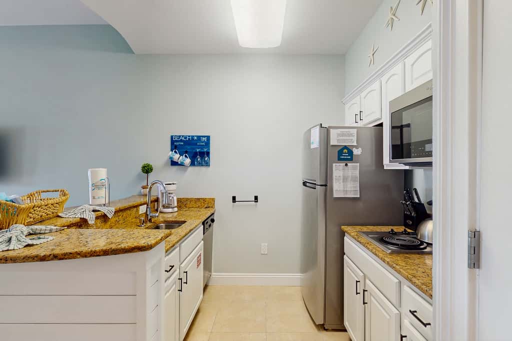 Lakefront dog-friendly condo with water views, pool, hot tub & beach access