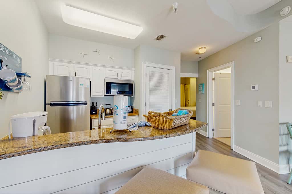 Lakefront dog-friendly condo with water views, pool, hot tub & beach access