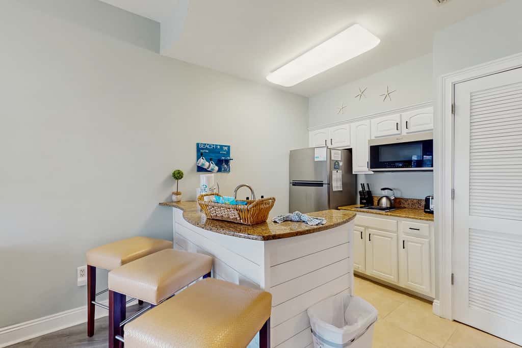 Lakefront dog-friendly condo with water views, pool, hot tub & beach access