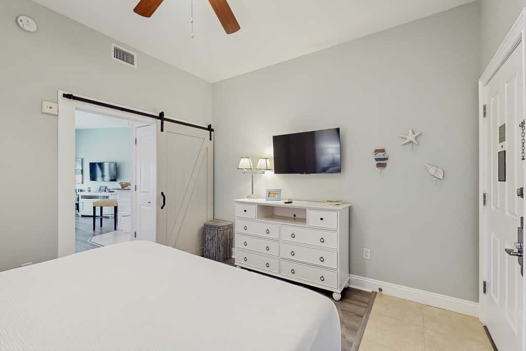 Lakefront dog-friendly condo with water views, pool, hot tub & beach access