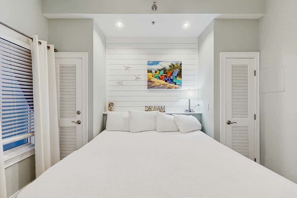 Lakefront dog-friendly condo with water views, pool, hot tub & beach access
