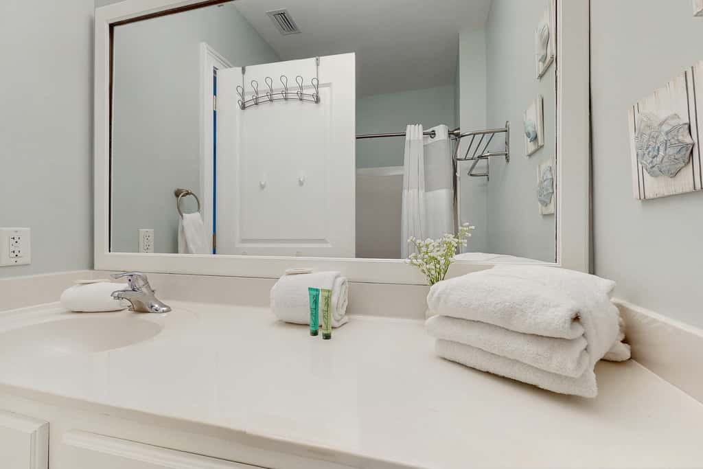 Lakefront dog-friendly condo with water views, pool, hot tub & beach access