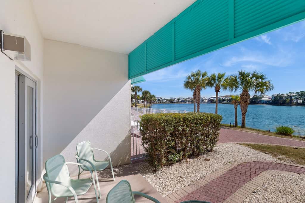 Lakefront dog-friendly condo with water views, pool, hot tub & beach access
