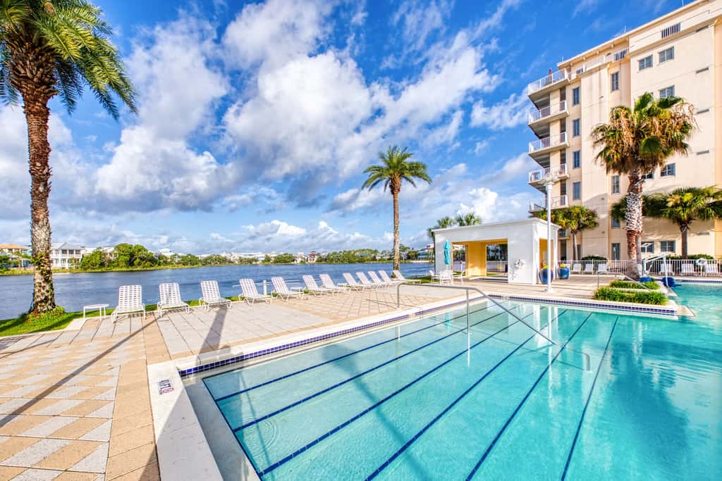 Lakefront dog-friendly condo with water views, pool, hot tub & beach access