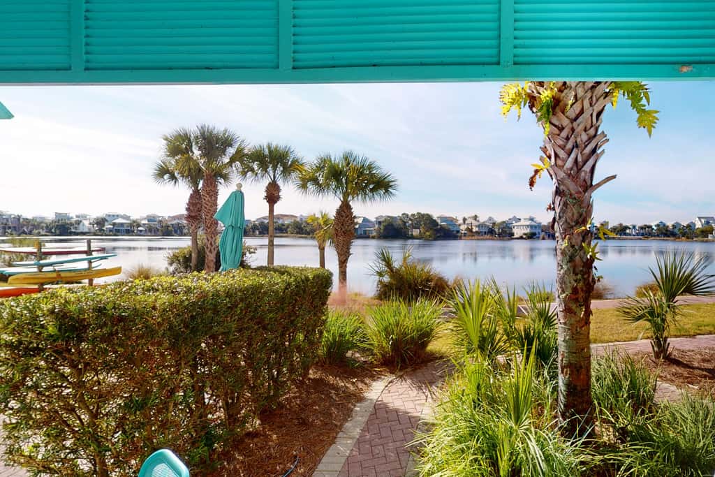 Lakefront dog-friendly condo with water views, pool, hot tub & beach access