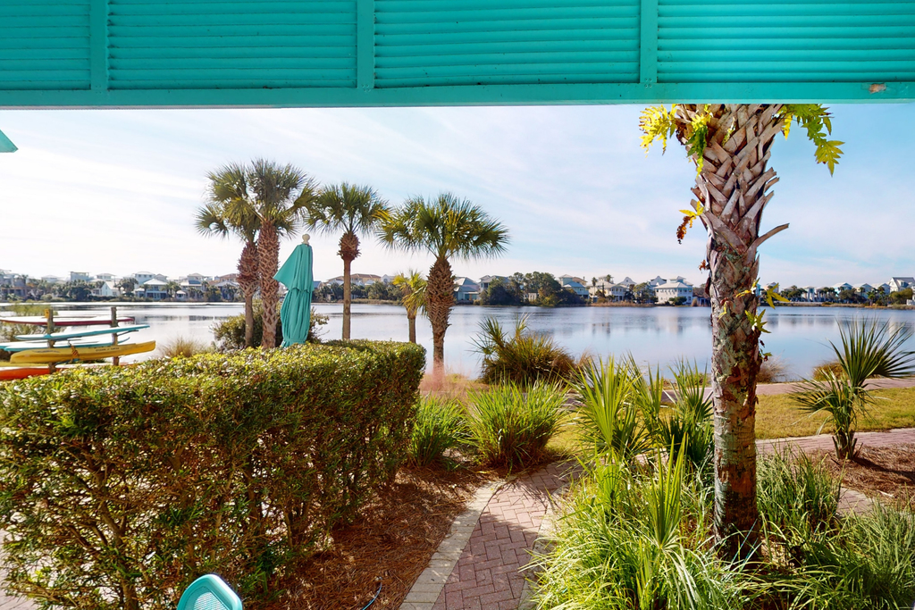 Lakefront dog-friendly condo with water views, pool, hot tub & beach access