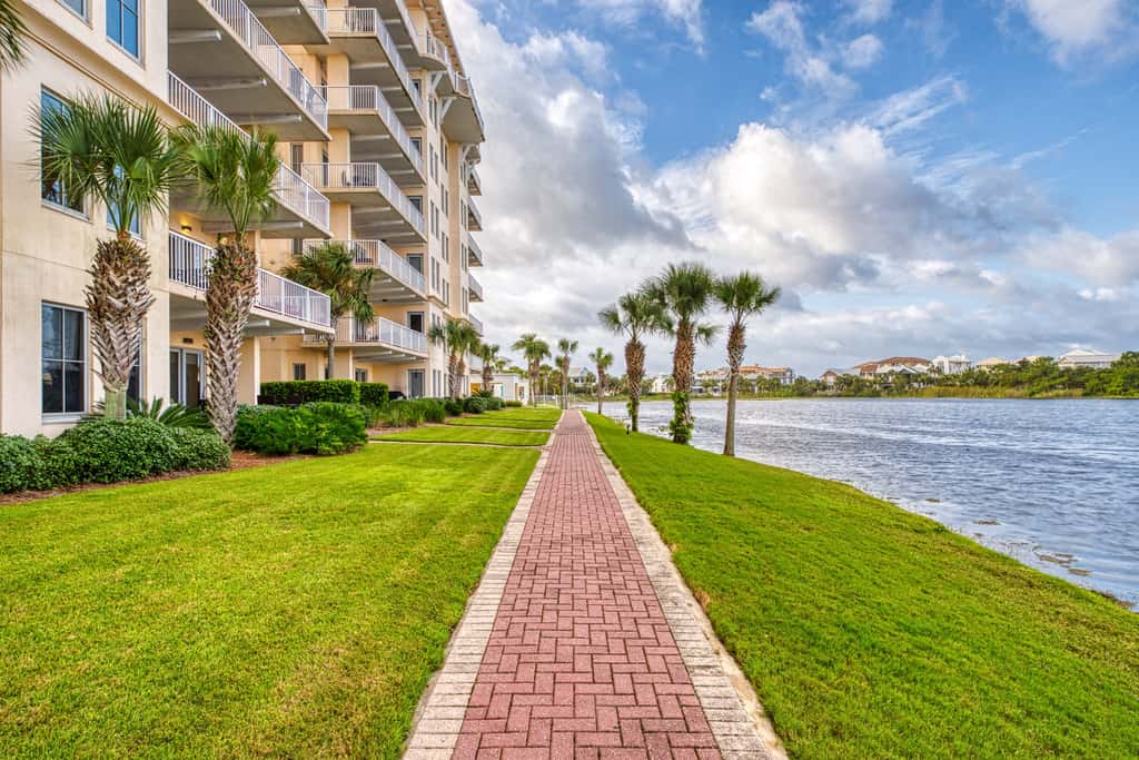 Lakefront dog-friendly condo with water views, pool, hot tub & beach access