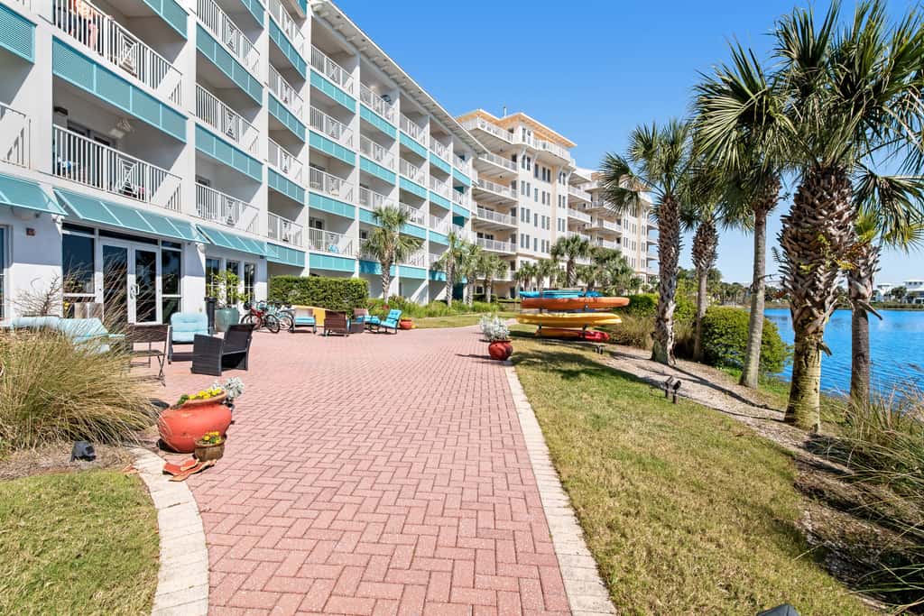Lakefront dog-friendly condo with water views, pool, hot tub & beach access