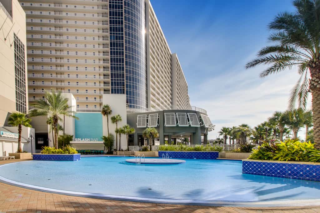 14th floor condo with pool & hot tub access, ocean view, WiFi, WD, & central AC