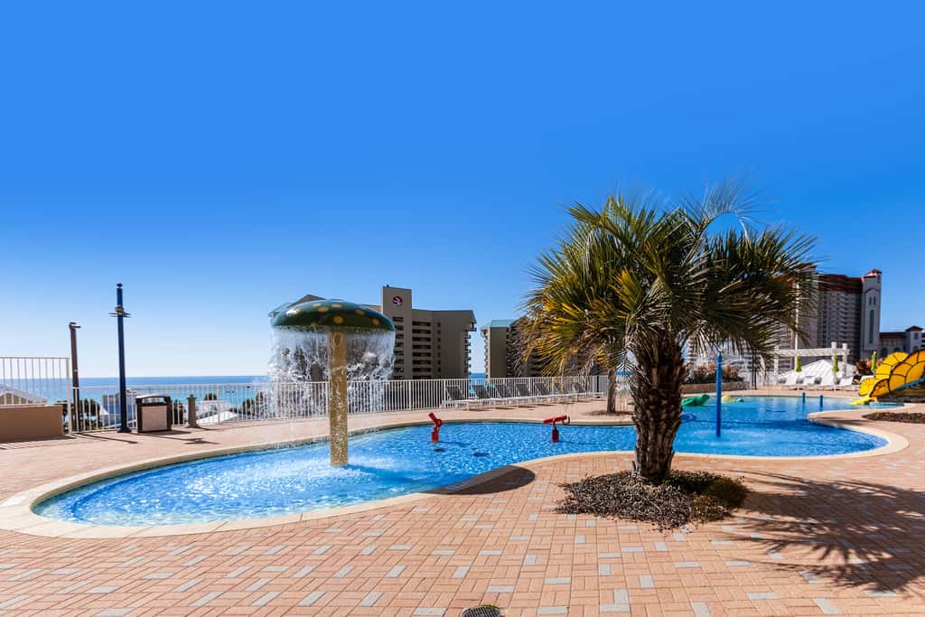 14th floor condo with pool & hot tub access, ocean view, WiFi, WD, & central AC