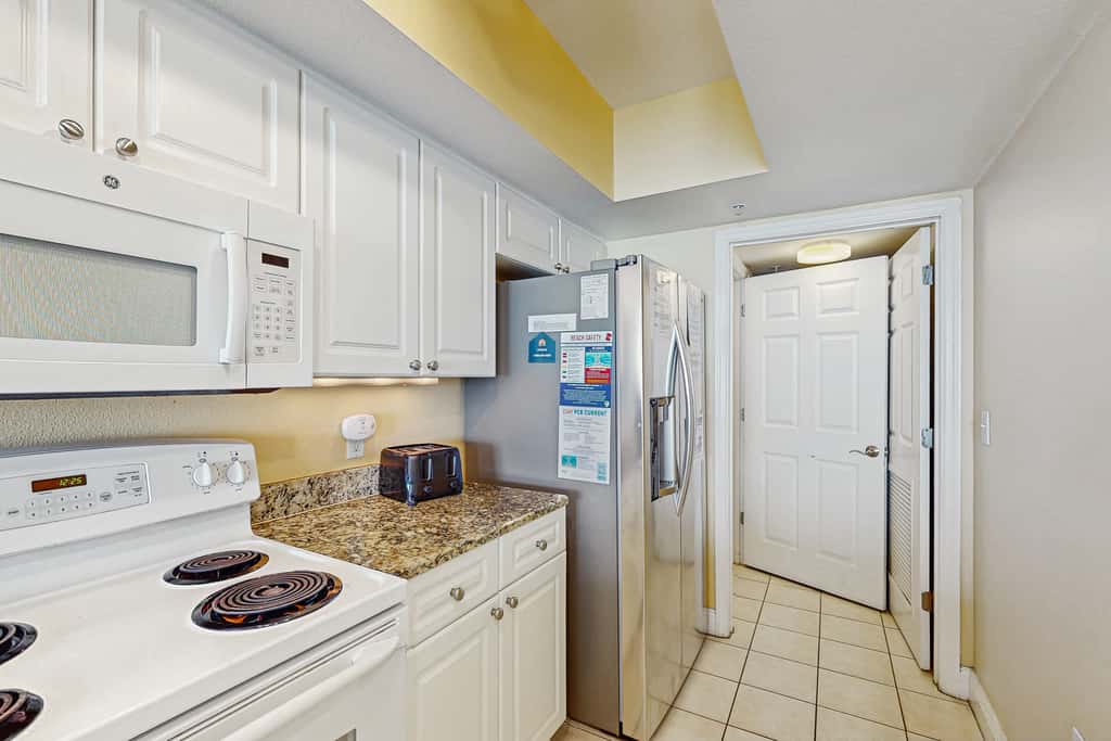 Roomy retreat on the water with private balcony, shared pool, & beach access