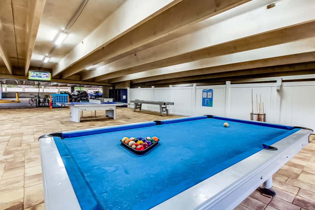 Roomy retreat on the water with private balcony, shared pool, & beach access
