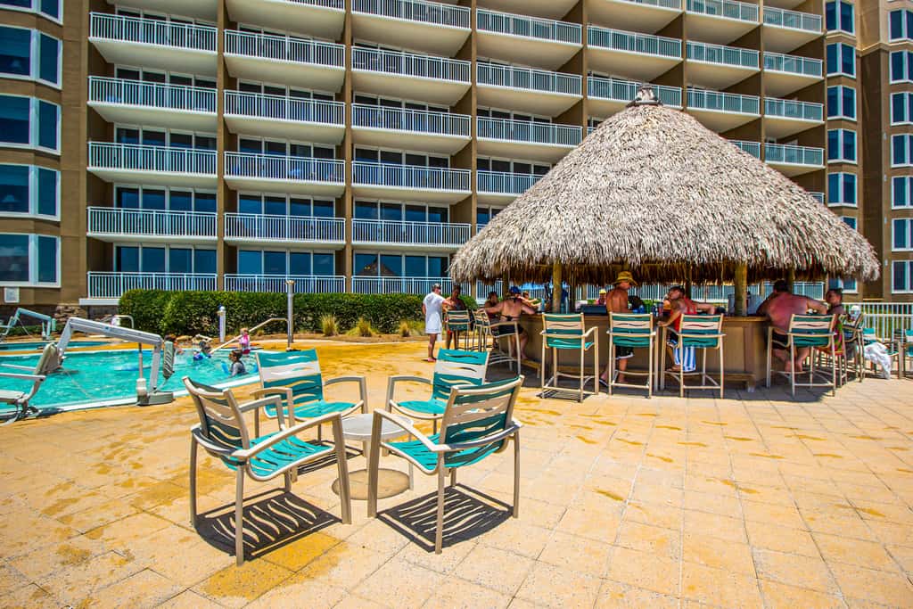 Roomy retreat on the water with private balcony, shared pool, & beach access