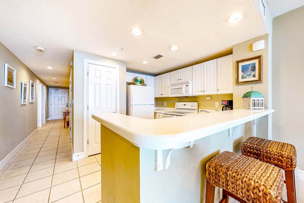 Sun-soaked oceanfront escape with pool, hot tub, central AC, & tennis court