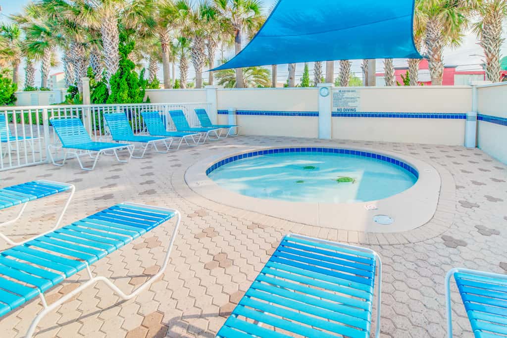 Sun-soaked oceanfront escape with pool, hot tub, central AC, & tennis court