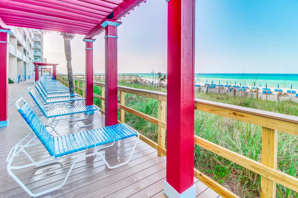 Sun-soaked oceanfront escape with pool, hot tub, central AC, & tennis court