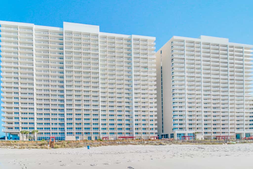 Sun-soaked oceanfront escape with pool, hot tub, central AC, & tennis court