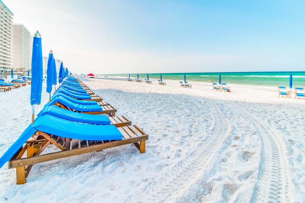 Sun-soaked oceanfront escape with pool, hot tub, central AC, & tennis court