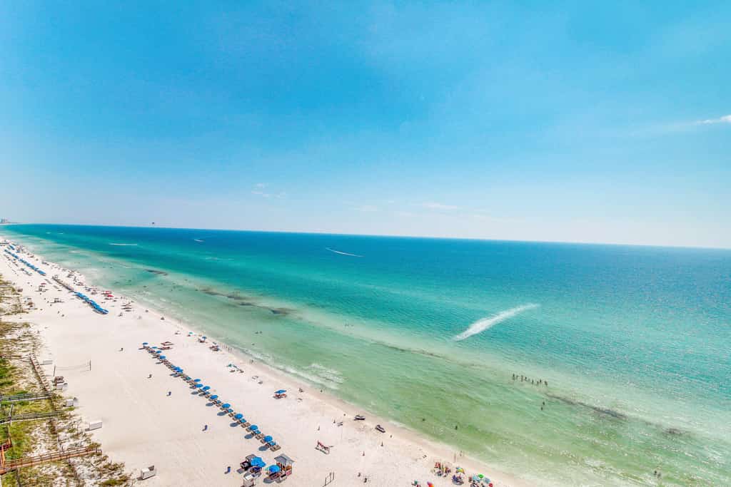 Sun-soaked oceanfront escape with pool, hot tub, central AC, & tennis court