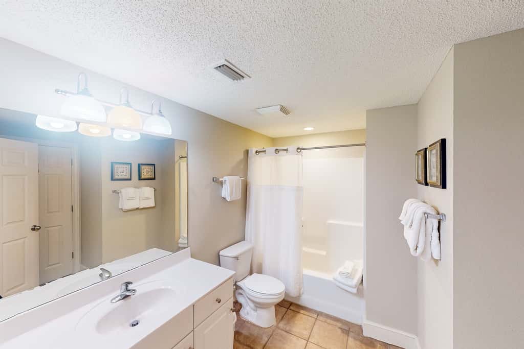 Gulf-front condo with 4 pools, movie theatre, game room, 3 hot tubs, tennis, W/D