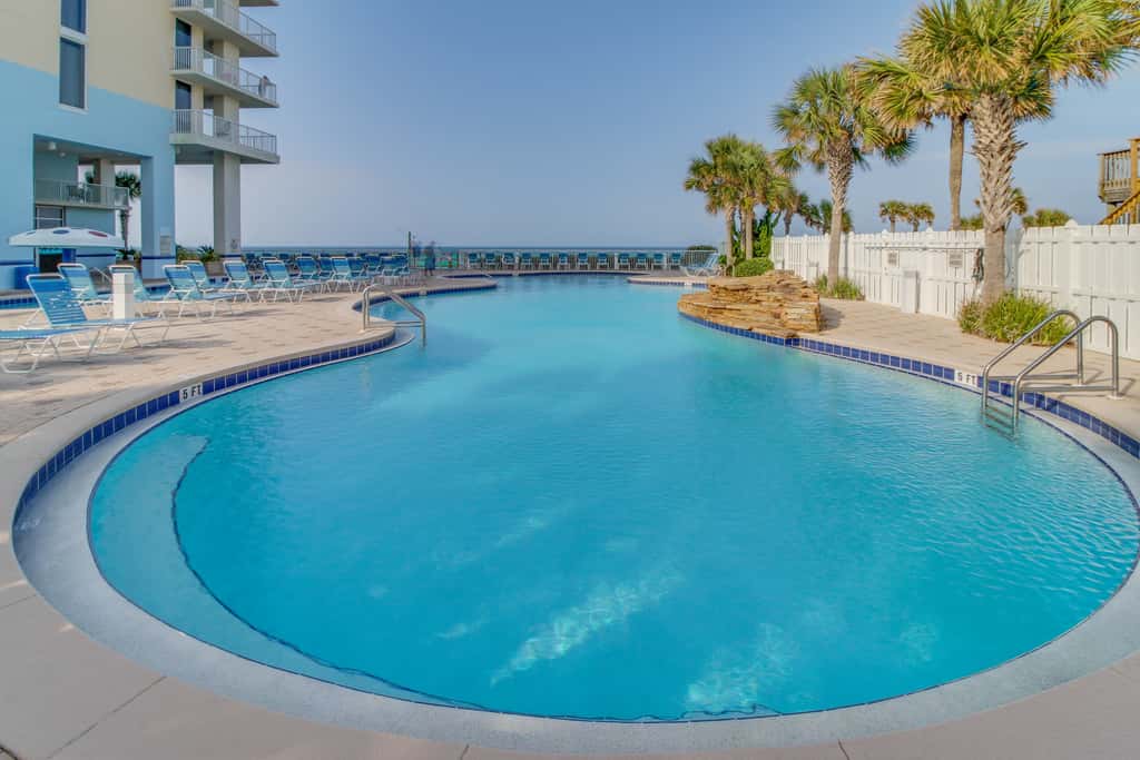 Gulf-front condo with 4 pools, movie theatre, game room, 3 hot tubs, tennis, W/D
