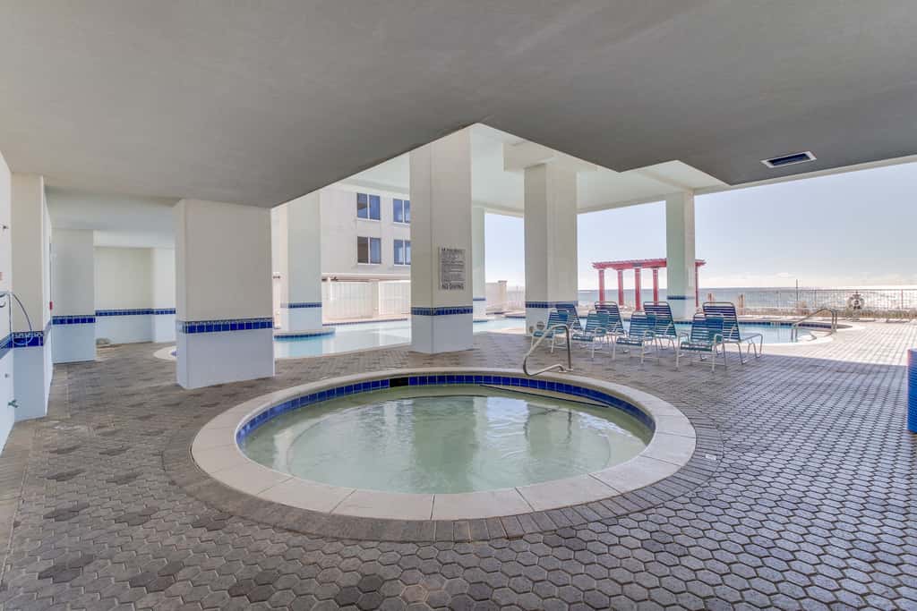 Gulf-front condo with 4 pools, movie theatre, game room, 3 hot tubs, tennis, W/D