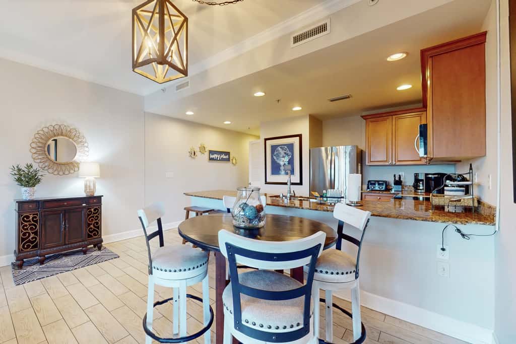3rd-floor beach & pool-view condo with outdoor pool, hot tub, grills, balcony