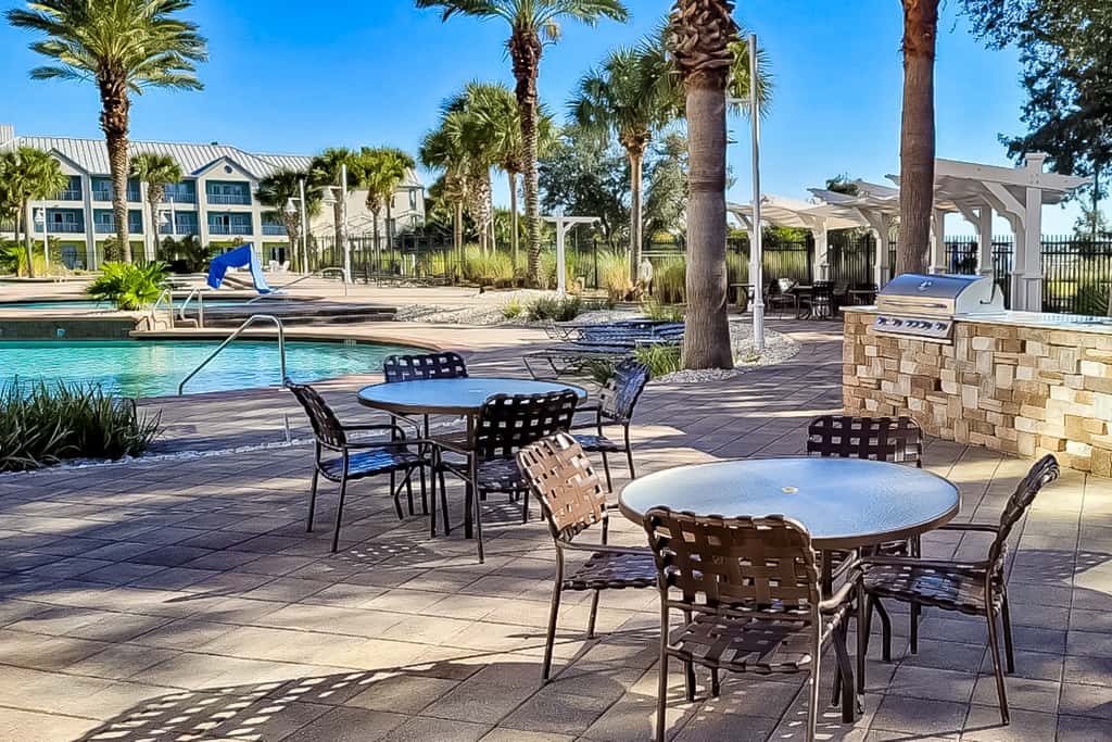 3rd-floor beach & pool-view condo with outdoor pool, hot tub, grills, balcony