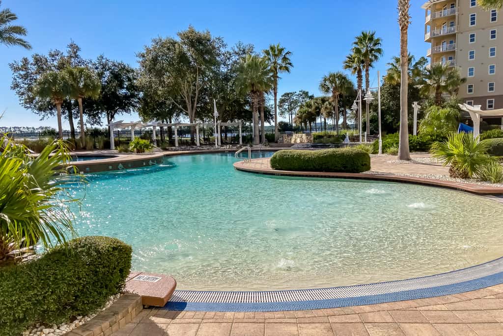 3rd-floor beach & pool-view condo with outdoor pool, hot tub, grills, balcony