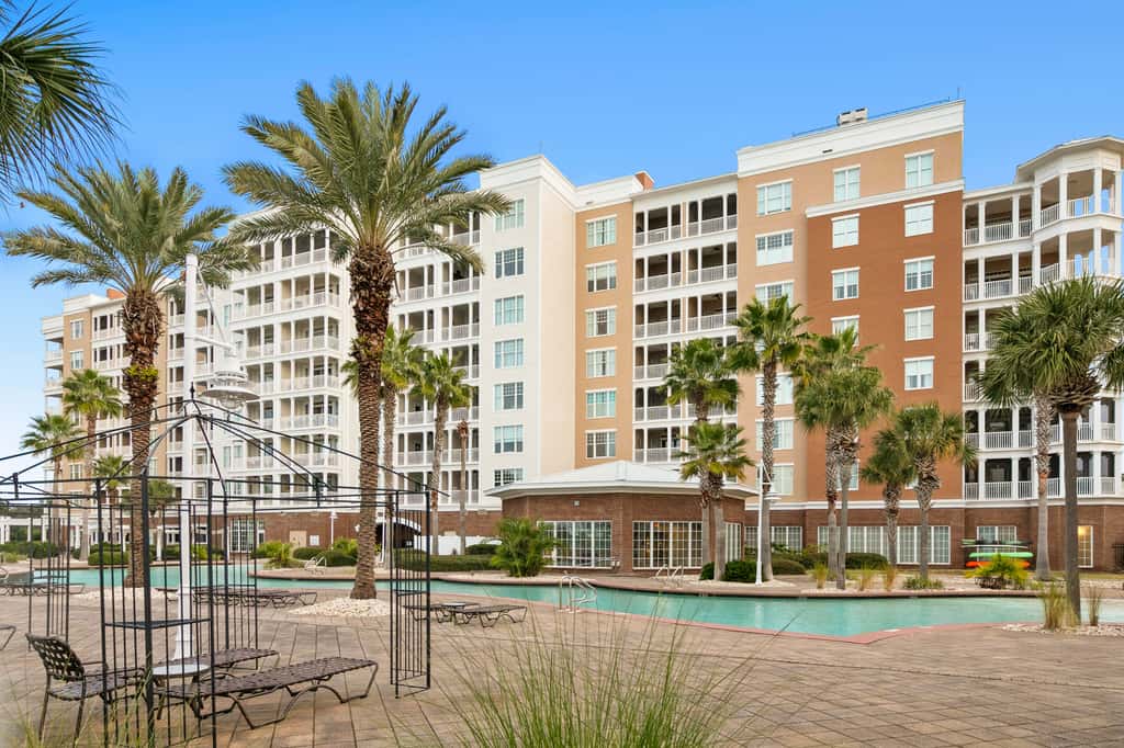 3rd-floor beach & pool-view condo with outdoor pool, hot tub, grills, balcony